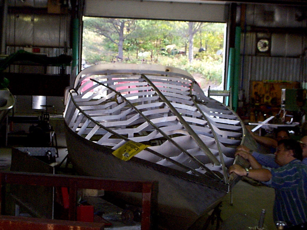 Vector 45 bow structure — transverse 3-inch U-channel frames on 6-inch centers landed on longitudinal stringers.